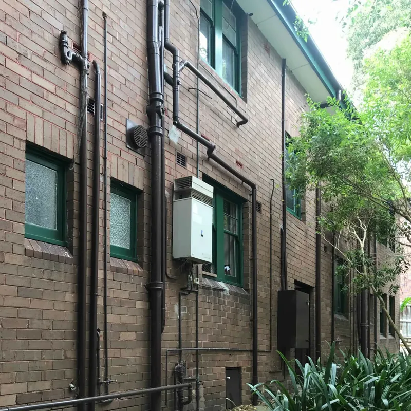 Side elevation of the Coogee apartment block, the double-skin brick wall that had bulged and cracked