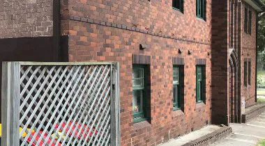 Brick elevation of the Coogee apartment block after the wall ties were replaced
