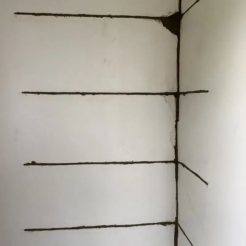 Full-height corner crack in the Berwick cottage reinforced with a ladder of HelicalBar™ bars grouted into the wall