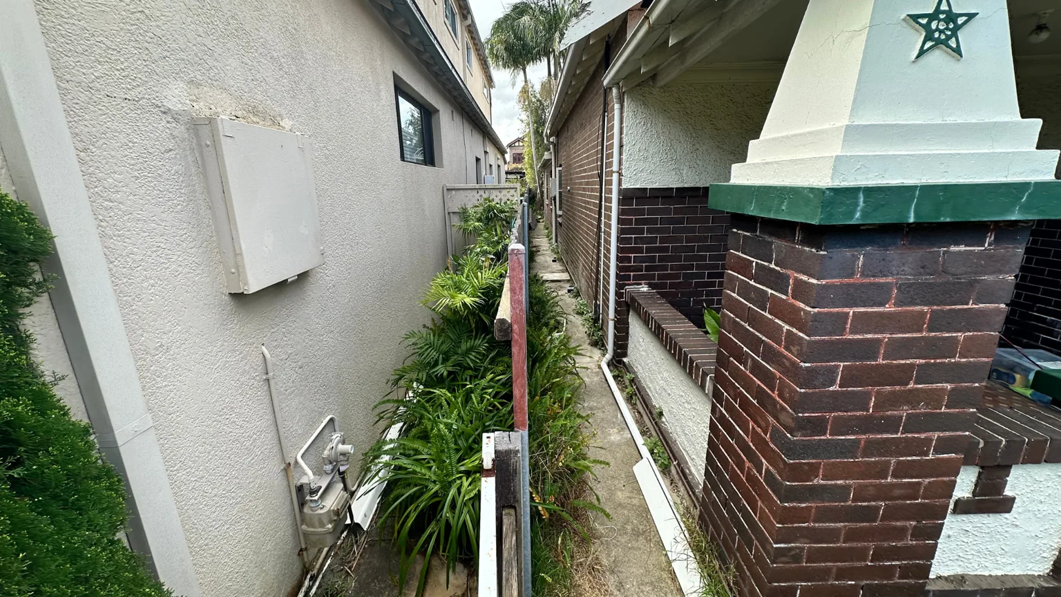 Cracked brick wall in Randwick home showing years of progressive movement