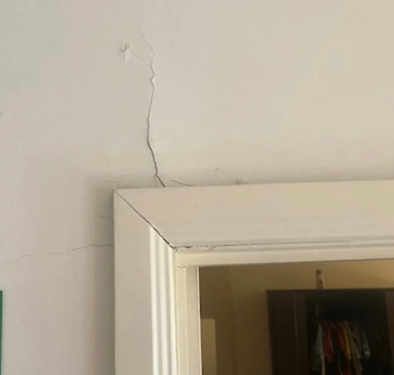 Wall crack above door frame in Kings Park home