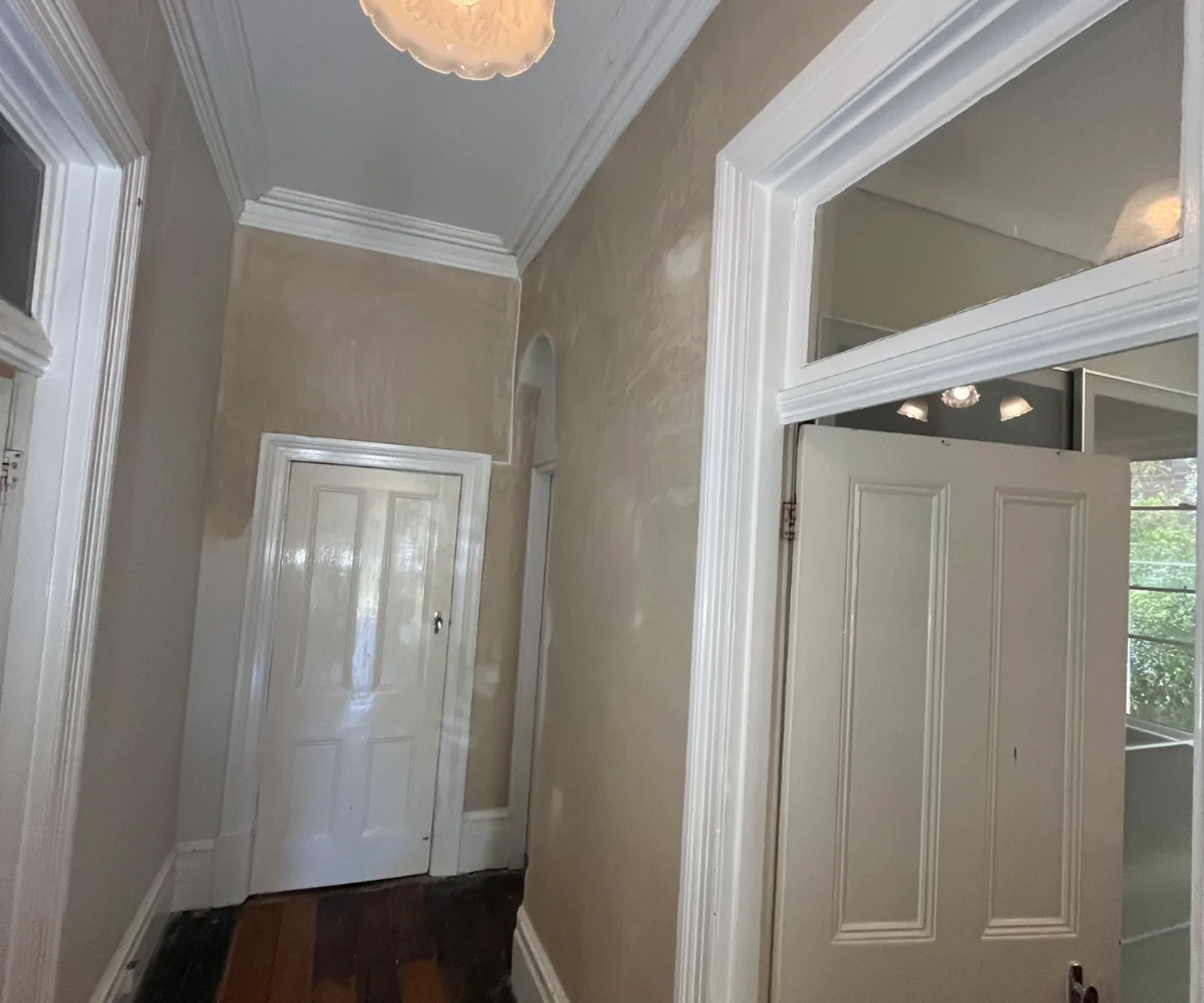 Repaired heritage brick walls with smooth paint-ready interior finish