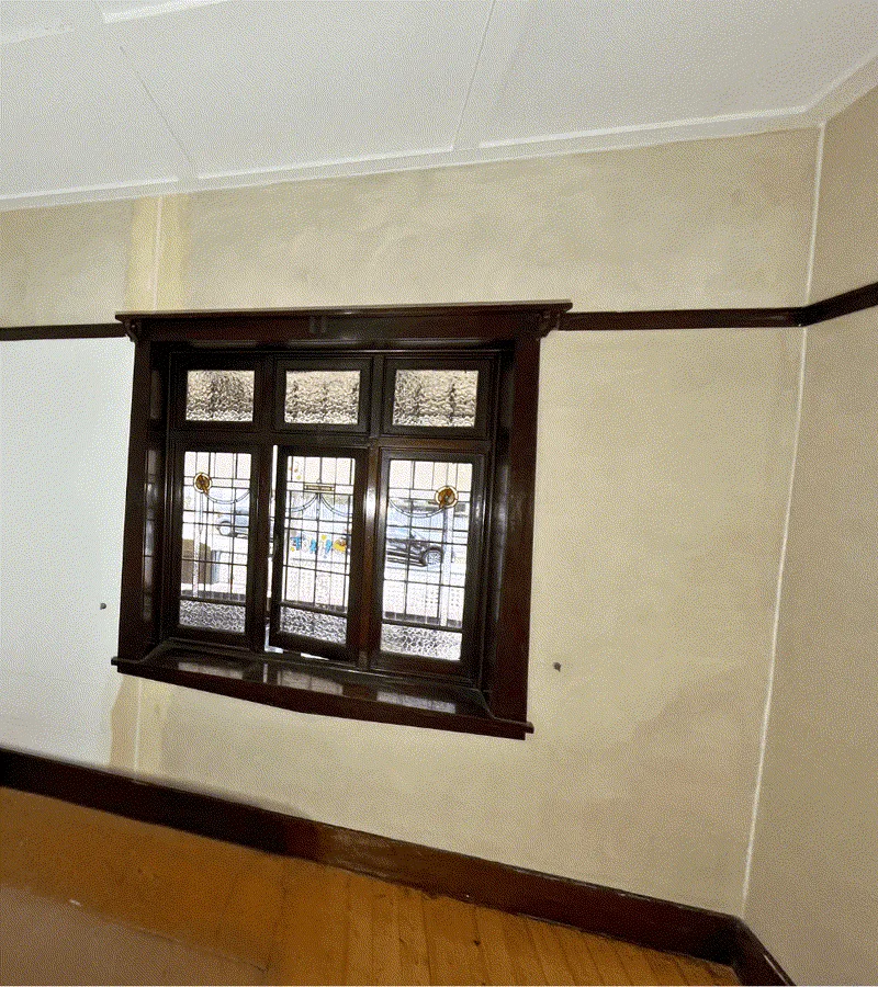 Same wall fully repaired with smooth paint-ready finish