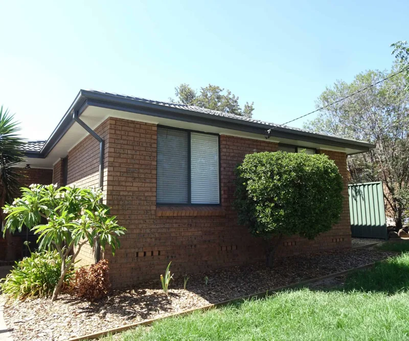 Western Sydney brick home on reactive clay showing stepped wall crack from foundation subsidence
