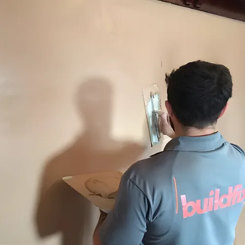 Smooth plaster wall finish after HelicalBar crack repair ready for painting