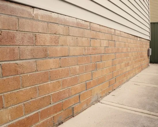 Repaired brick wall with colour-matched mortar finish after HelicalBar wall crack repair