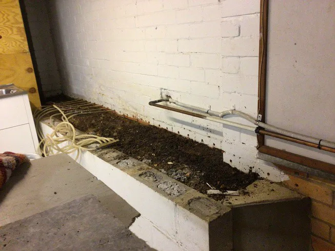 Plaster wall repair before and after — stained plaster restored