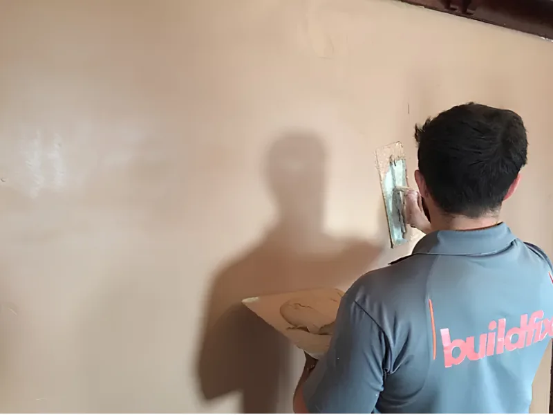 Walls stripped and finished with salt-retardant base coat after DampBlock treatment
