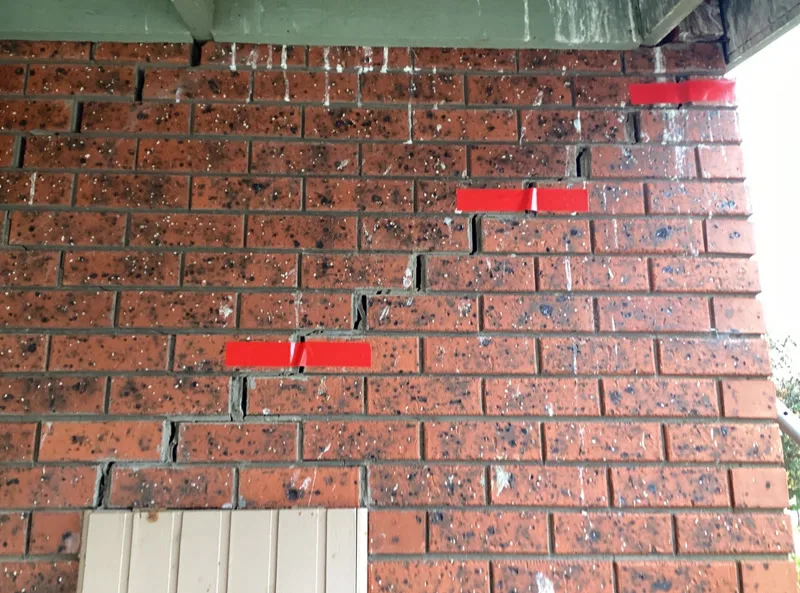 Same brick wall with crack closed after foundation repair