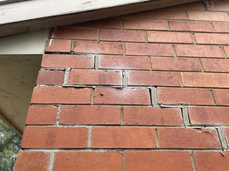 Same brick wall area showing crack closed
