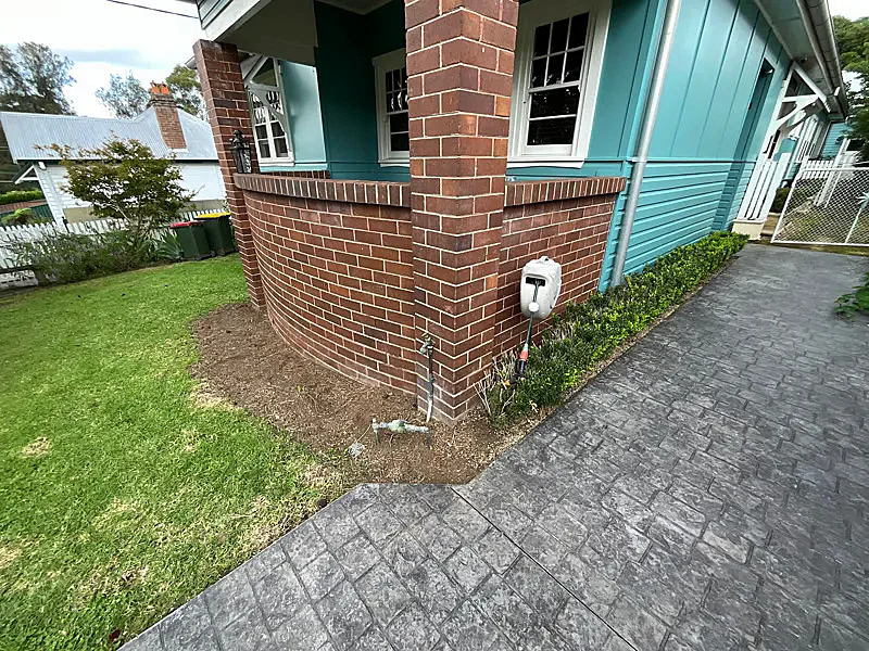Brick Veranda Realigned to Save the Roof