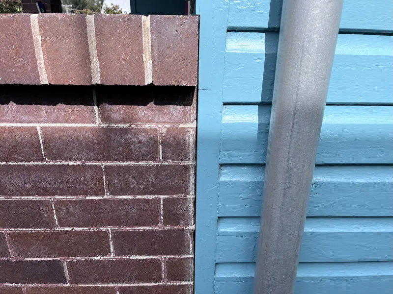 Same brick pier top with gap closed after repair