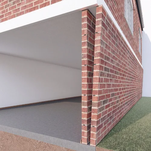 Exterior brick wall visibly leaning away from the structure