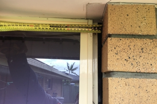 A large crack in the brick wall due to subsidence