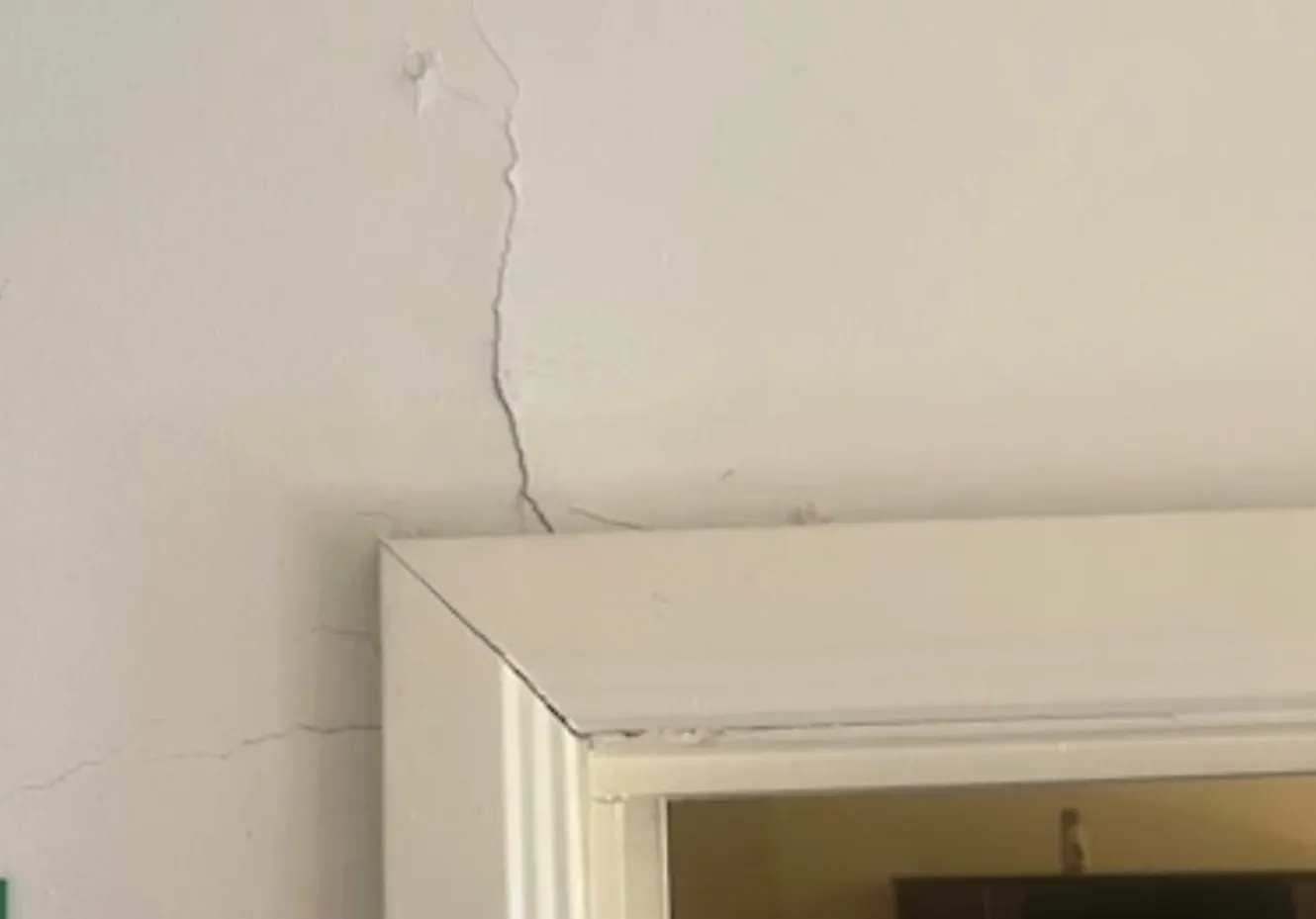 Sinking Brick Piers Stabilised and Living Room Floor Restored Brief
