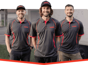 Buildfix team for foundation repair consults, wearing branded uniforms onsite.