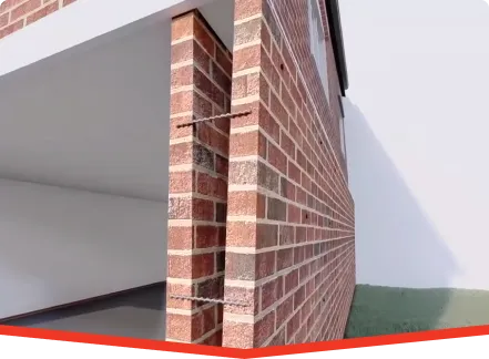 Brick veneer wall repair with metal ties preventing subsidence and foundation movement.