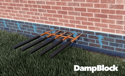 Animated tools creating channels in brick wall to treat rising damp.