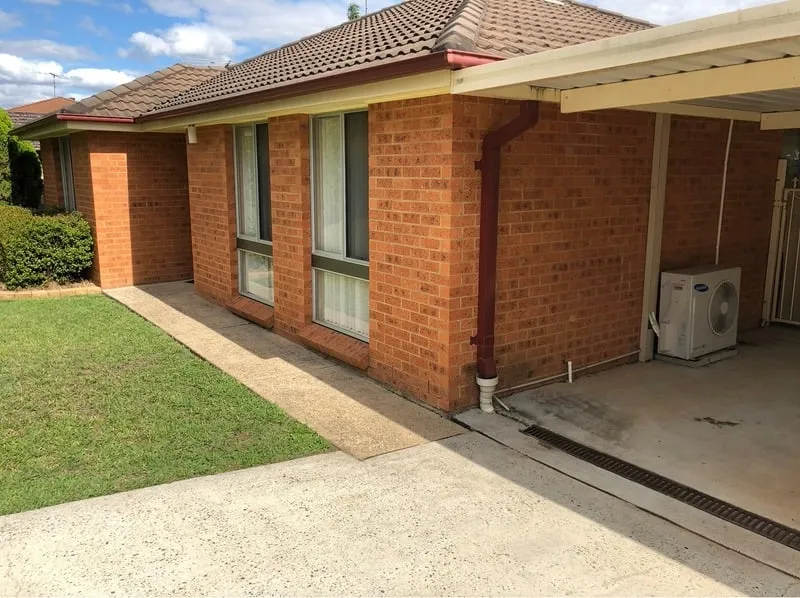 Gutter system installation to improve drainage.